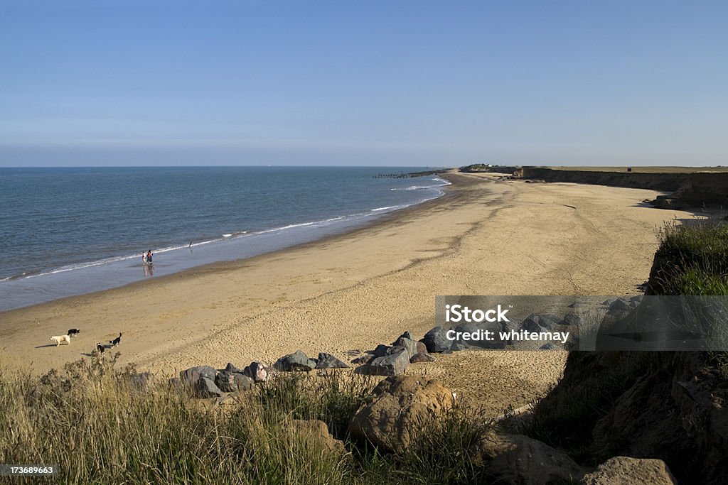 Coastal erosion "The beach at Happisburgh (pronounced Hayesborough) in Norfolk, which is being eroded rapidly by the North Sea.  More Happisburgh:" Bay of Water Stock Photo