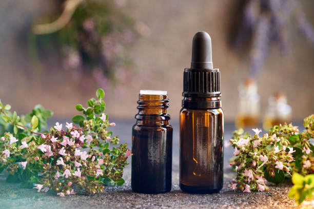 istock Dropper bottles of oregano essential oil on a table 1736931233