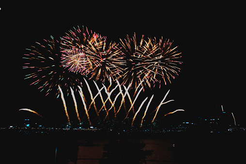 Colorful fireworks in the sky on New Year's Eve, rituals to welcome New Year in every corner of the world, fireworks celebrating New Year's Eve Welcome the new year.