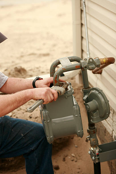 istock Plumber Repairing Water Pipe 173694020