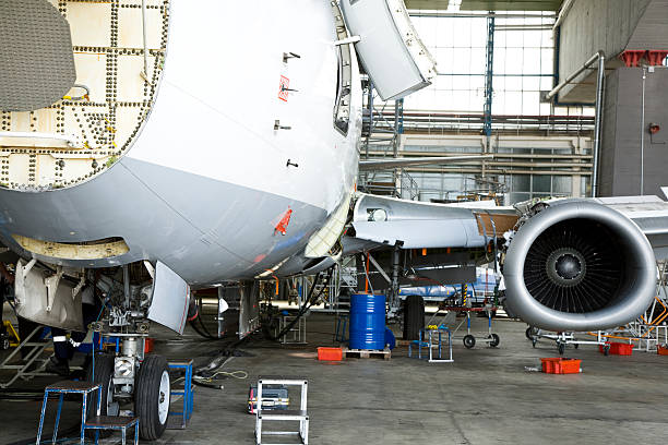 istock Commercial Airplane Maintenance Check in Hangar 173695429