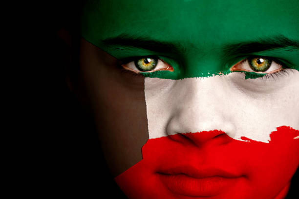 istock Kuwait flag boy 173696065