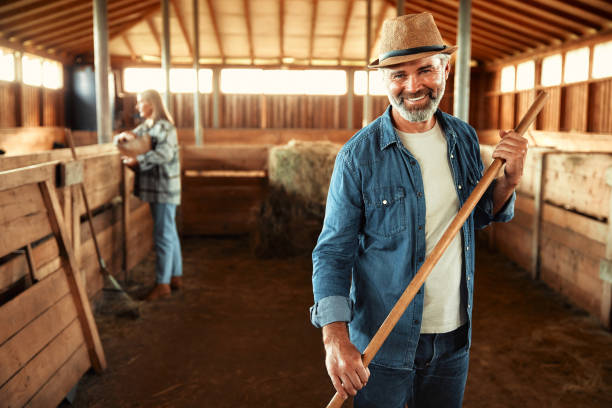 istock Mature couple working on the farm 1736960708