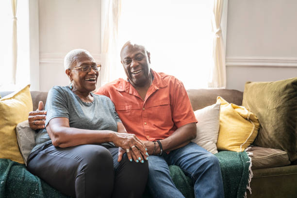 Relaxed African-American seniors at home