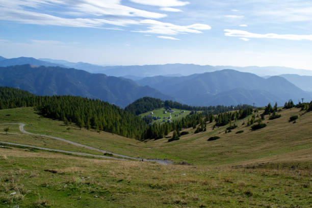 istock Alpine green meadows and forests on an autumn sunny day 1736977595