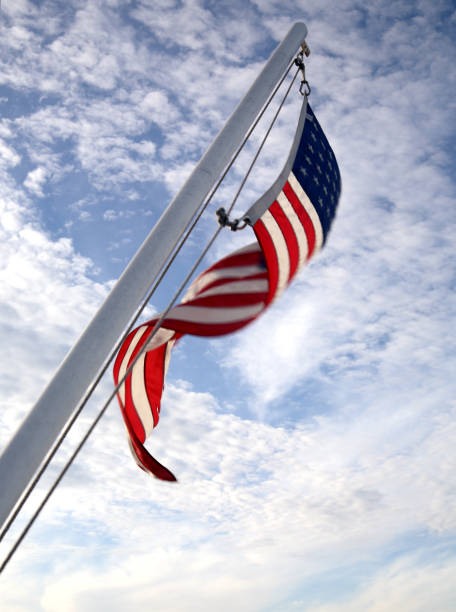 istock American flag flapping in the breeze 173699383
