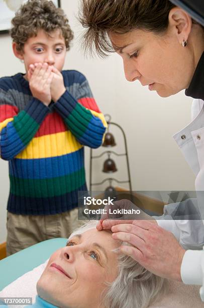 Boy At The Accupuncturist Stock Photo - Download Image Now - Acupuncture Needle, Acupuncturist, Adult