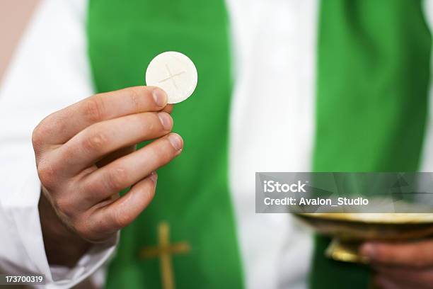 Priest Of Communion In The Hand Stock Photo - Download Image Now - Communion, Last Supper, Catholicism