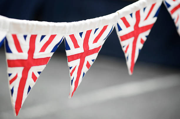 istock British Flag Union Jack Bunting Dark Background 173700696