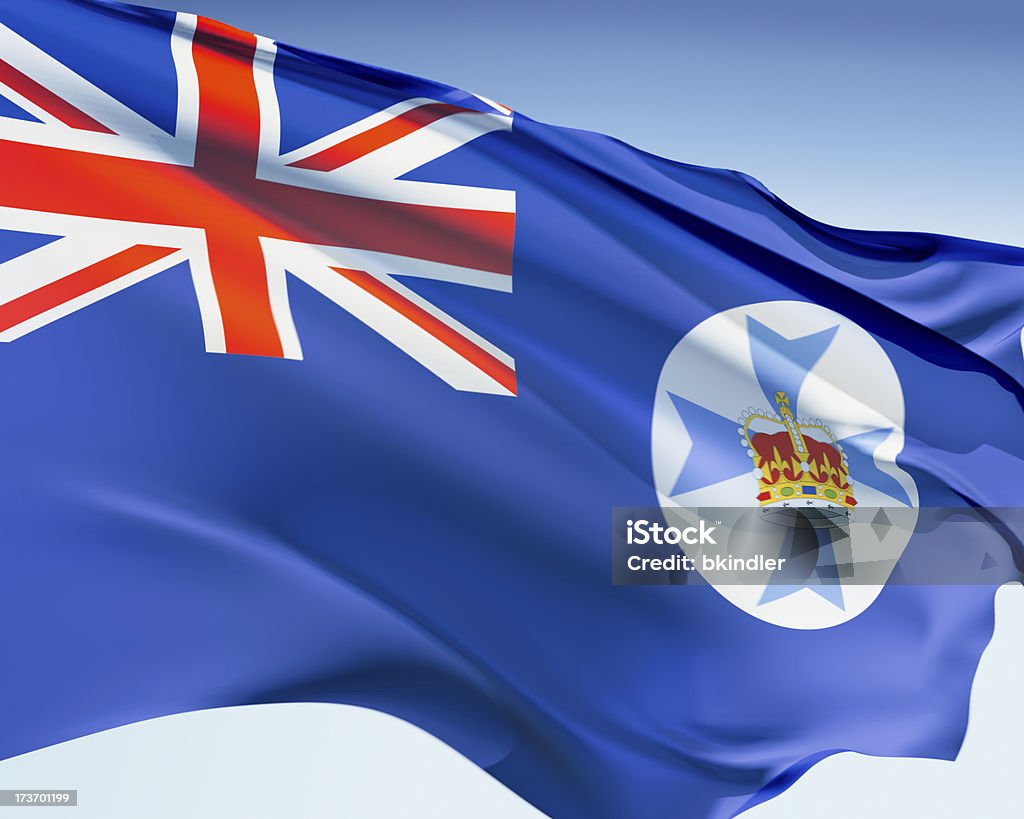 Flag of Queensland Queensland flag waving in the wind. Elaborate rendering including motion blur and even a fabric texture (visible at 100%). Flag Stock Photo