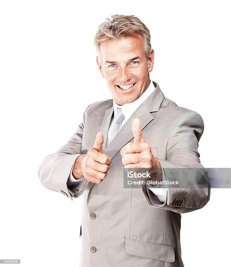 Бизнесмен, стоя с большие пальцы вверх - Стоковые фото 60-64 года роялти-фри