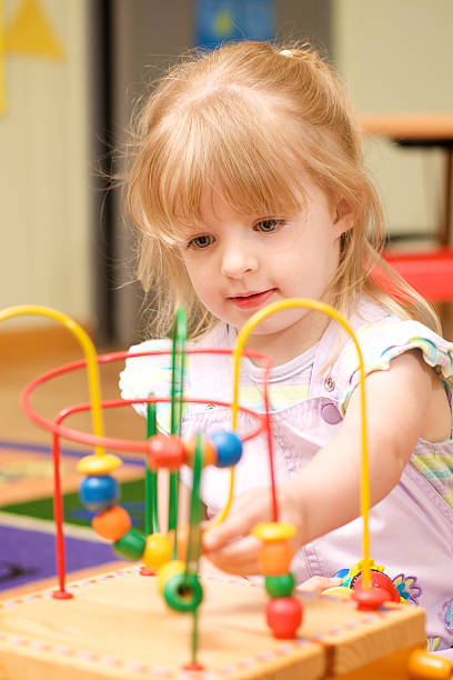 istock child playing in a daycare 173701929