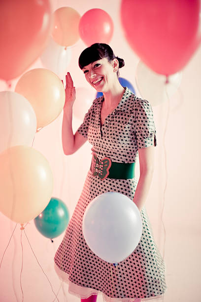 istock Woman with balloons 173702565
