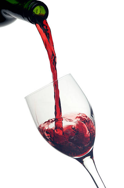 istock Pouring red wine into a glass 173702611