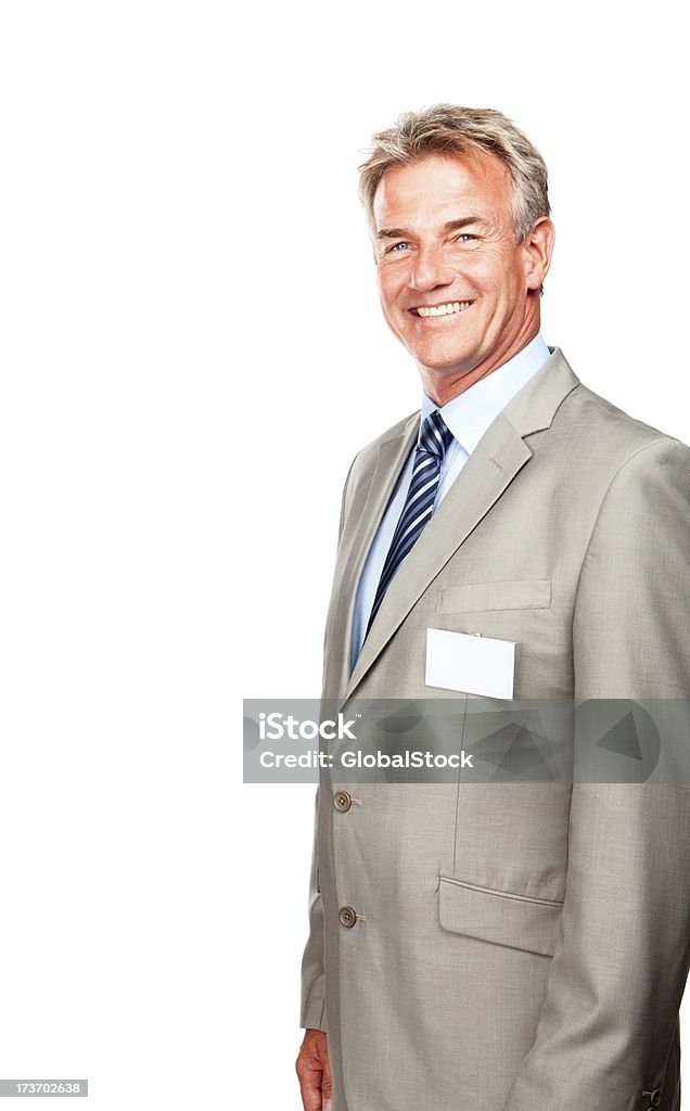 Empresário confiante sênior usando um crachá - Foto de stock de 60 Anos royalty-free