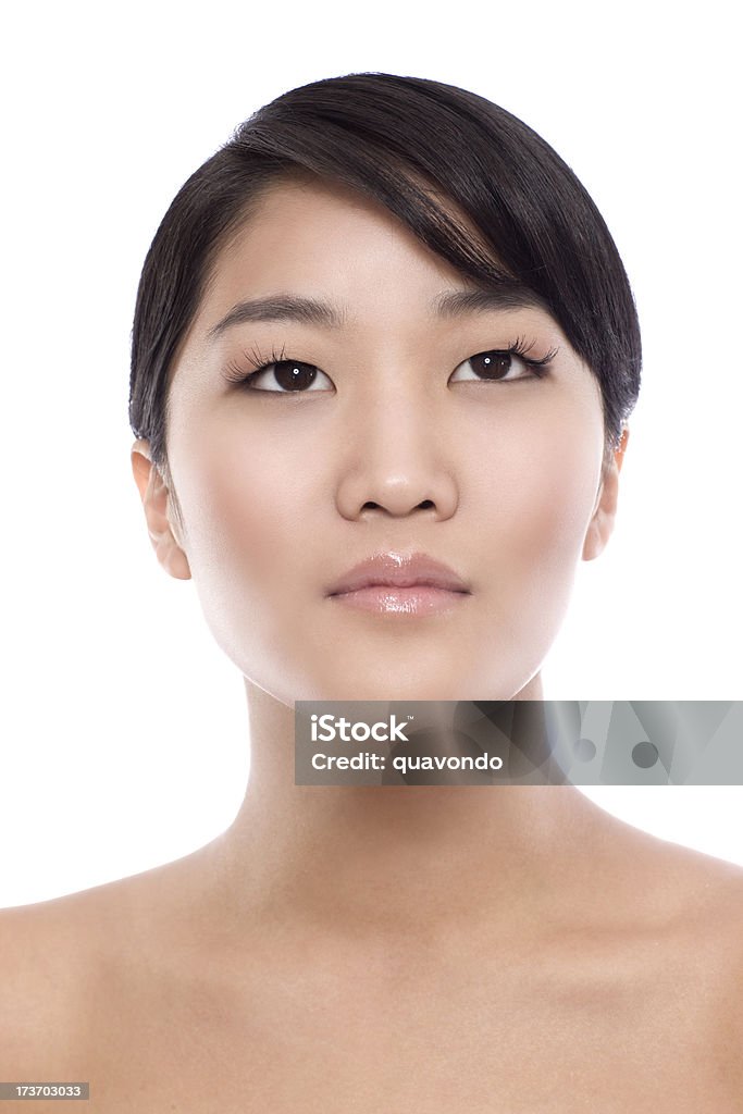 Asian Young Woman Beauty Model Portrait on White Natural-looking Asian female looking up. CLICK FOR SIMILAR IMAGES AND LIGHTBOXES WITH MORE BEAUTIFUL WOMEN OR ETHNIC FACES. 20-29 Years Stock Photo