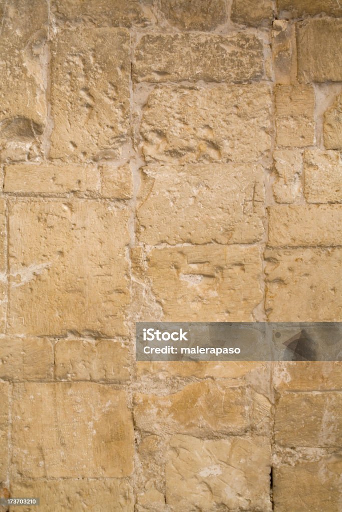 Ancient stone wall Ancient stone wall of a Romanesque cloister. To see more Wall images click on the link below: Ancient Stock Photo