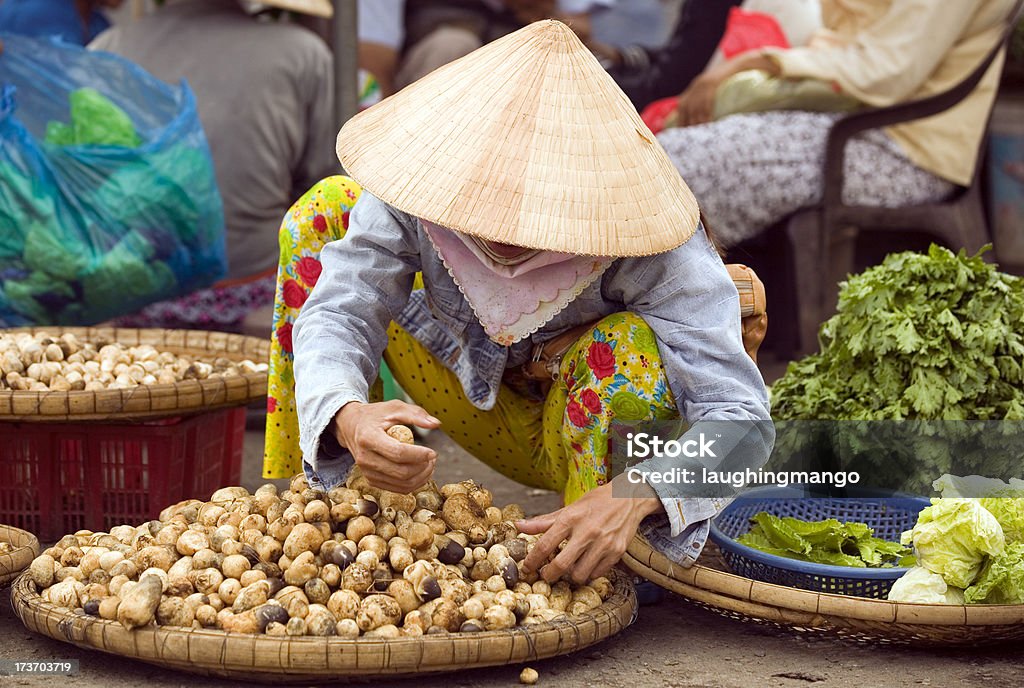 vietnam street market lady seller ho chi minh saigon vietnamese woman market vendor Ho Chi Minh City Stock Photo