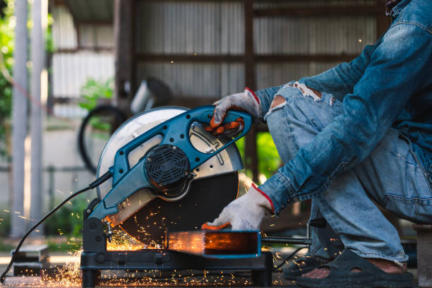 istock Cutting metal with a Circular Saw with sparkling light. 1737040387
