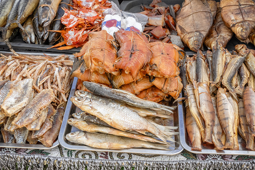 Salted, smoked and dried fish are sold at a street stall