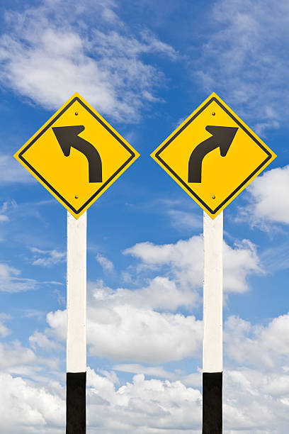 istock Left and right curved road signpost 173706514