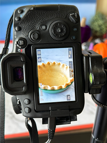Stock photo showing the set up of a food photography studio photo shoot with view of actual final image in camera view finder.