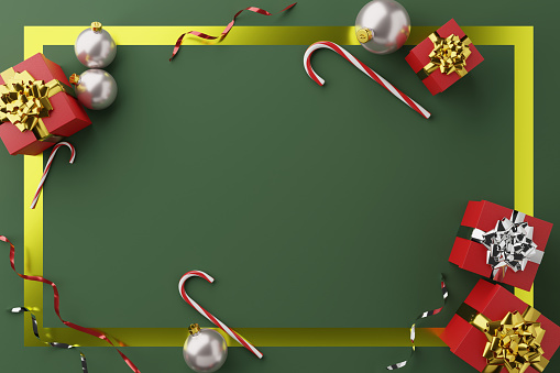 Top view of a 3D Render of a christmas frame with copy space on green background. The composition includes some christmas gifts, candy canes and christmas balls.