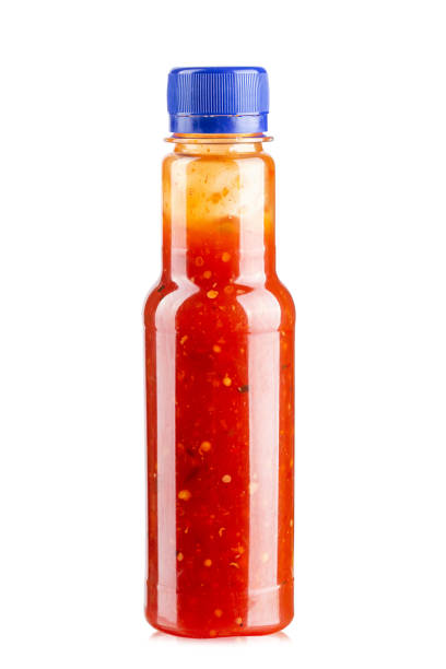istock Plastic sauce bottle without label isolated on white background. Top view. 1737079768
