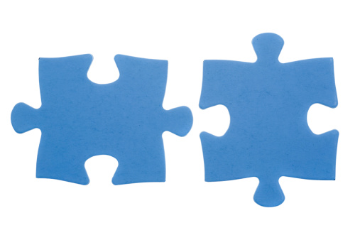 Blue jigsaw pices isolated on white
