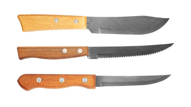 istock Three different kitchen knives with a wooden handle. Isolated on white background. 1737081567