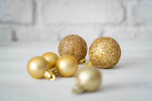 Christmas Stars, Baubles and Gold Ribbons on white.