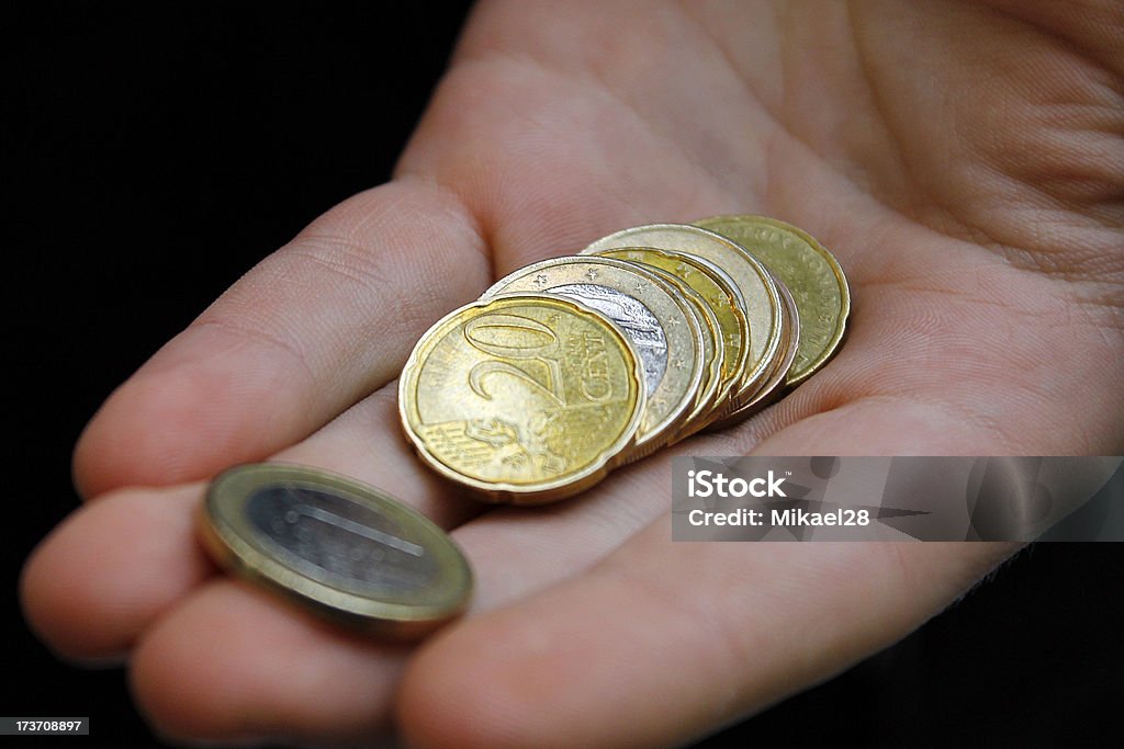 Pièces de monnaie sur un coup de main - Photo de Horizontal libre de droits