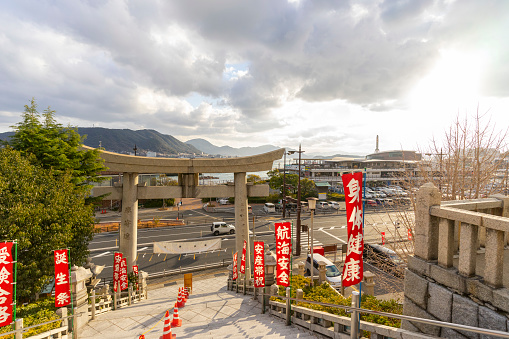 Shimonoseki, Japan - December 29,2022 : View of the Tori entrance to Kameyama Hachimangu shrine in Shimonoseki, Japan on December 29,2022.