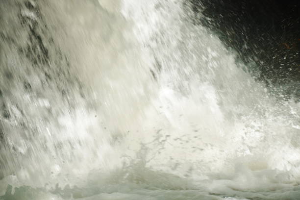 istock water falling on river pass rock and stone at north Chet Kod waterfall 1737100967