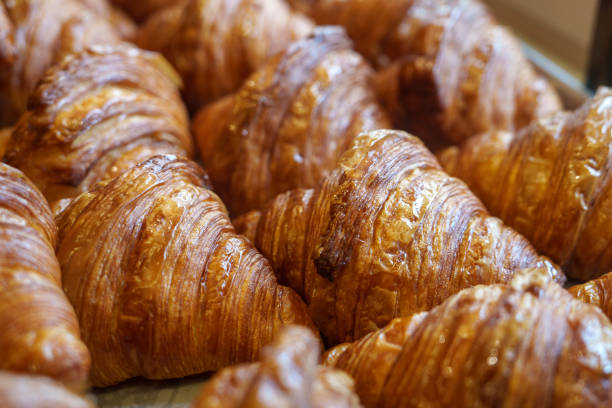 istock Freshly baked croissants in a bakery 1737102091