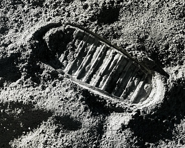 footprint on moon - moon stok fotoğraflar ve resimler
