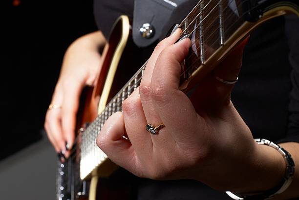 istock Woman with guitar 173711574