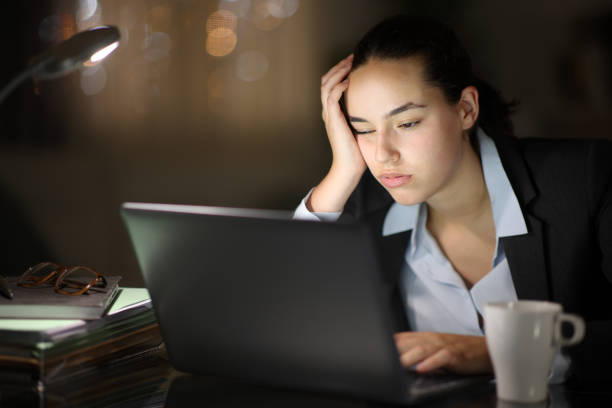 istock Tired executive working in the night 1737139790
