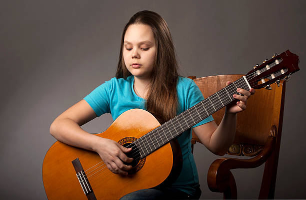 istock Girl with guitar 173714663