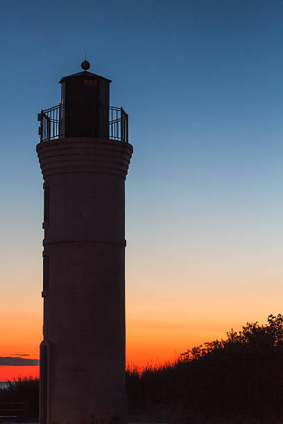istock Robert H. Manning Memorial Lighthouse at Dusk 173716880