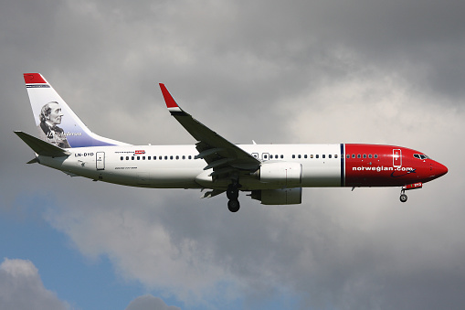 Dragor, Denmark - June 21, 2010: Norwegian Air Shuttle Boeing 737-800 with registration LN-DYD on short final for runway 04L of Copenhagen Airport, Kastrup.