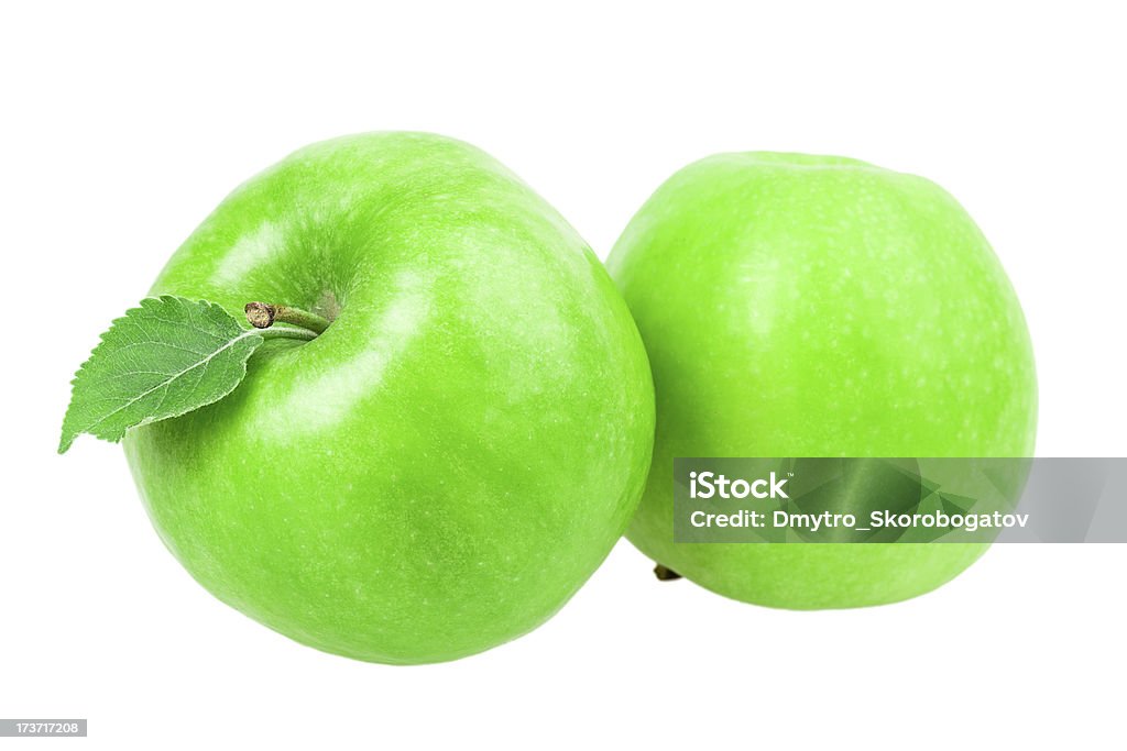 Due Mela verde con foglia - Foto stock royalty-free di Alimentazione sana