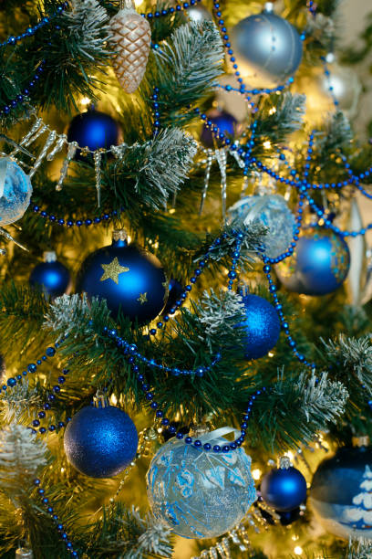 istock Blue and silver baubles on christmas tree for background. New Year concept. 1737173033