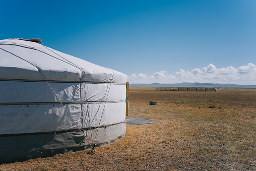 Mongolian Yurt in the Mountains during Sunrise