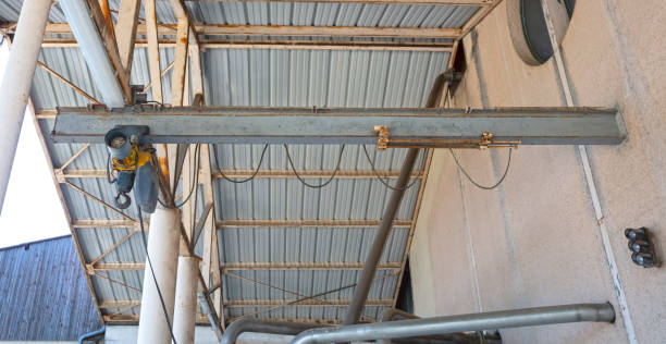 istock Beam with a motor and a hook, for moving heavy stuff 1737182372