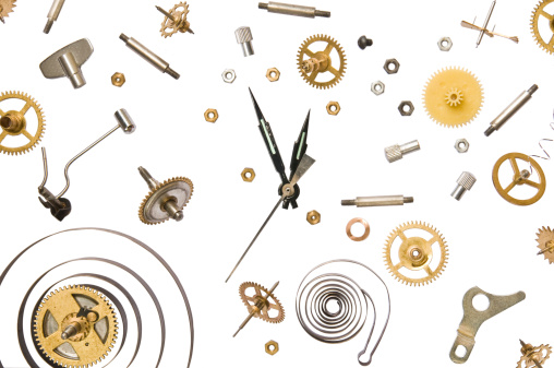 parts of clock mechanism on pure white background