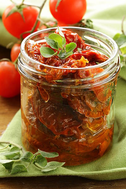istock sun dried tomatoes with  olive oil 173719673