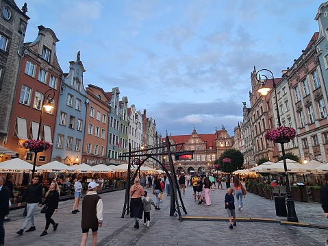 Gdansk, Poland – July 28, 2023: Dluga Street, a picturesque street cafés in the old town of Gdansk, Northern Poland.