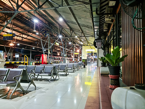 Yogyakarta, Indonesia - 27 September 2023: In the hushed moments of the early morning, the waiting area at Yogyakarta Station exudes an aura of serenity and anticipation