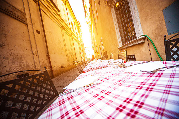 istock Typical outdoors restaurant in Rome alley 173722359